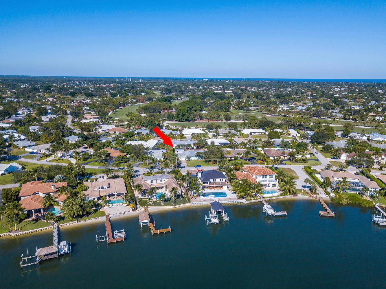 100 River Drive Tequesta, FL 33469 - Photo 41 of 54 an aerial view of a houses with city view