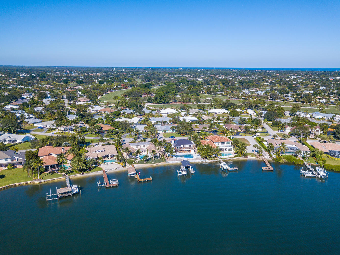 100 River Drive Tequesta, FL 33469 - Photo 42 of 54 an aerial view of residential houses with outdoor space and trees