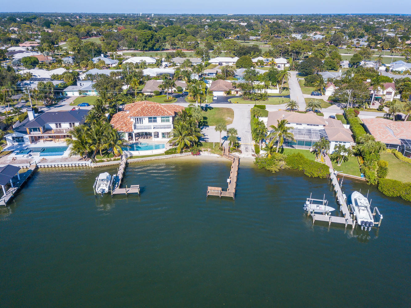 100 River Drive Tequesta, FL 33469 - Photo 43 of 54 an aerial view of residential houses with outdoor space