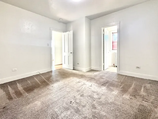 an empty room with a natural light