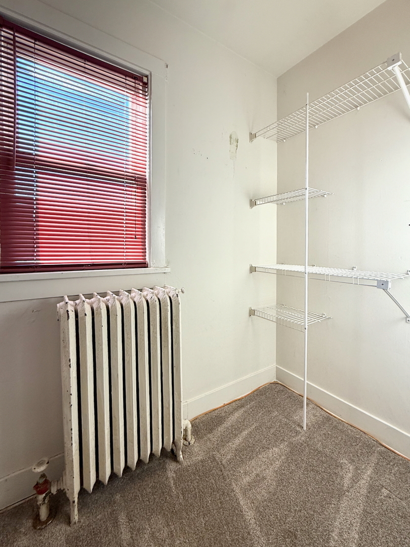 203 Symphony Way, Unit 203A Elgin, IL 60120 - Photo 15 of 18 a view of a room with cabinet