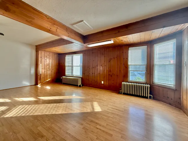 a view of an empty room and window