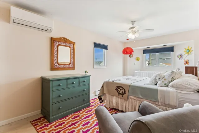 a bedroom with furniture and a bed