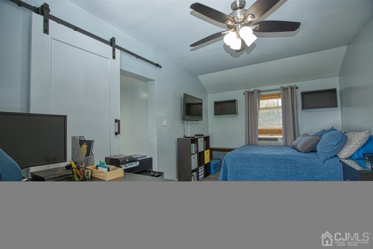 91 River Road Sayreville, NJ 08872 - Photo 27 of 36 3rd bedroom view, barn door slides for privacy.