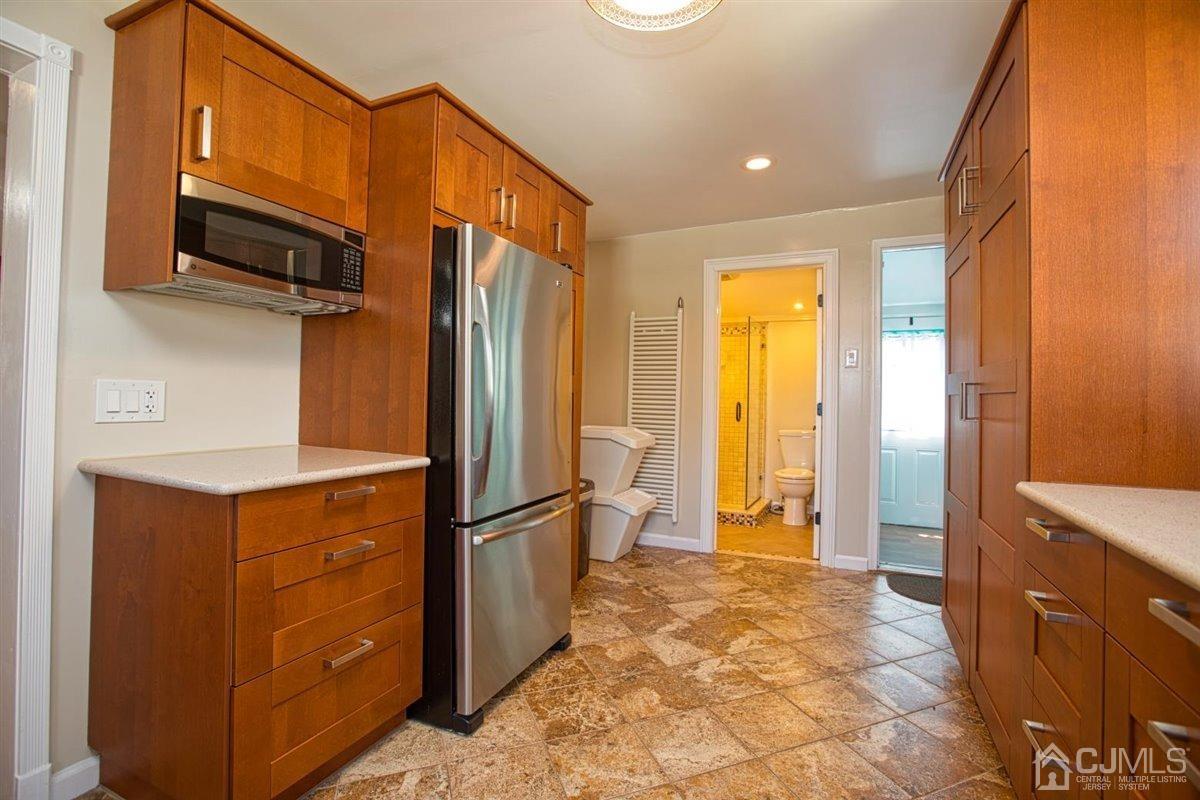91 River Road Sayreville, NJ 08872 - Photo 10 of 36 Under-mount microwave oven, stainless steel appliances.