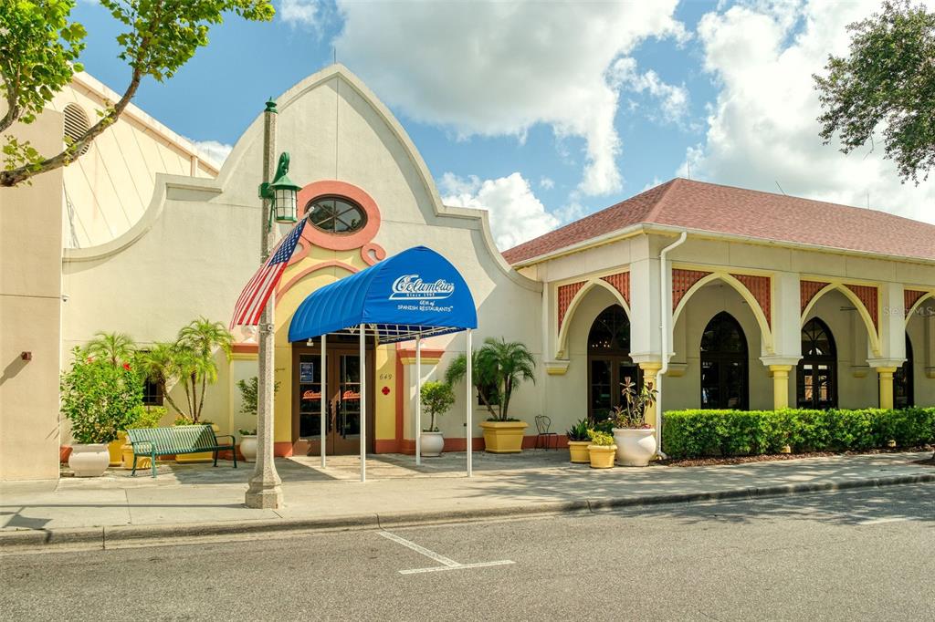 1400 Celebration Avenue, Unit 406 Celebration, FL 34747 - Photo 40 of 51 a front view of a house with a garden