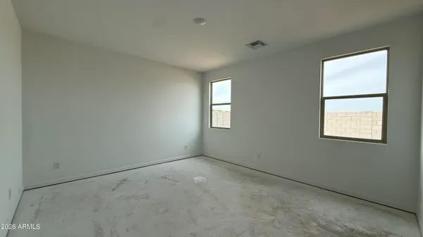 an empty room with windows