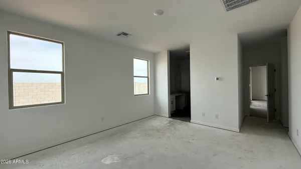 an empty room that has a window