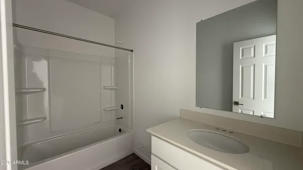 a bathroom with a sink and a bathtub