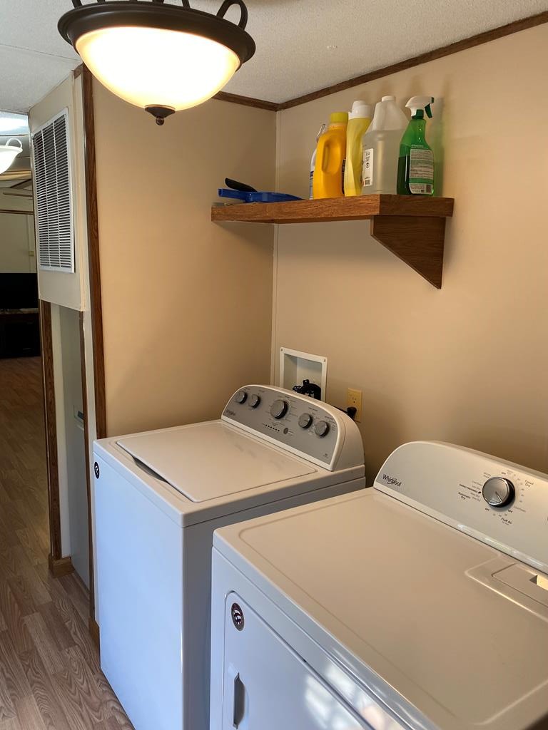 313 Lonesome Pine Road Bybee, TN 37713 - Photo 28 of 48 a utility room with dryer and washer
