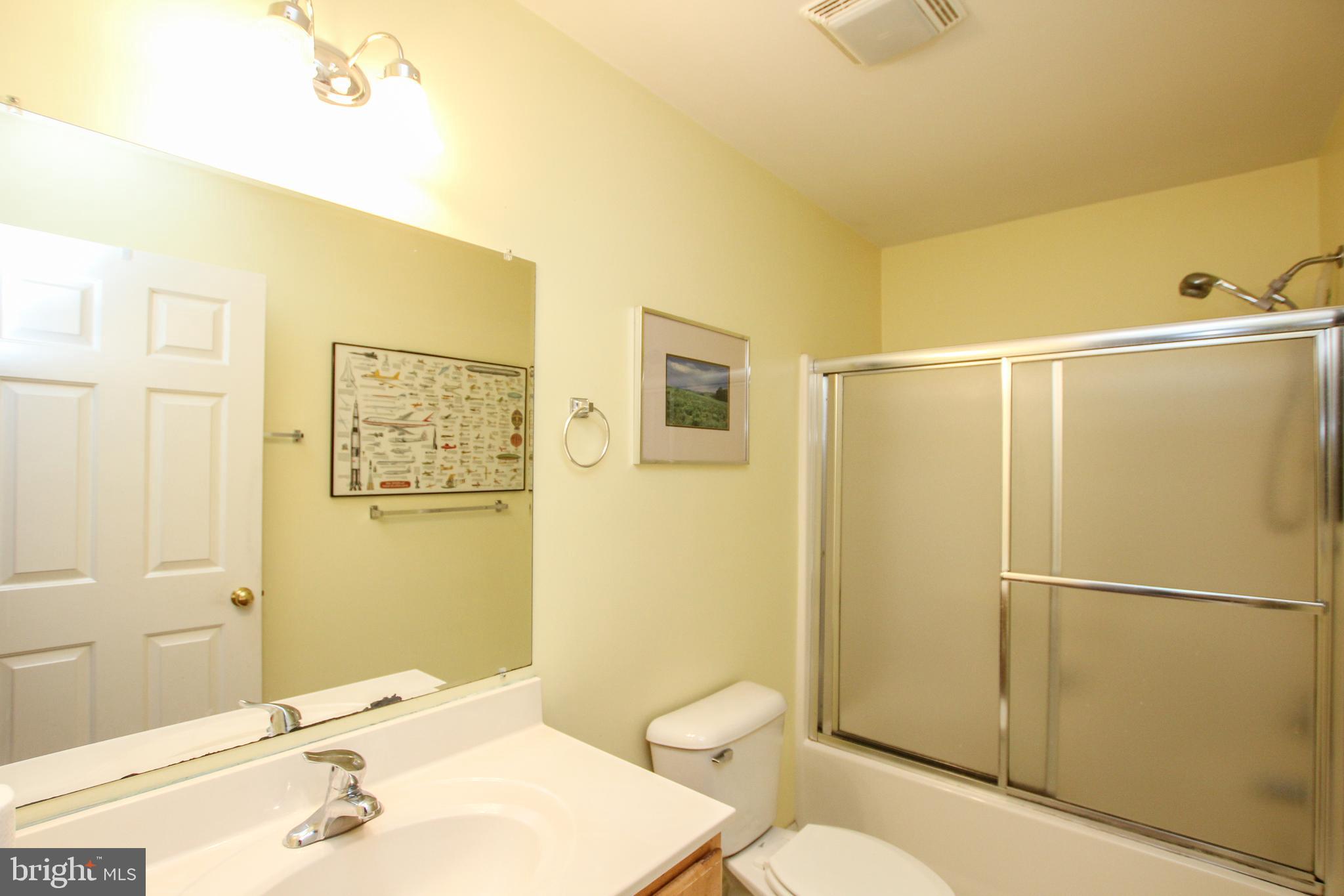 28549 Round Pole Bridge Road Milton, DE 19968 - Photo 17 of 22 Full Bathroom in Hallway