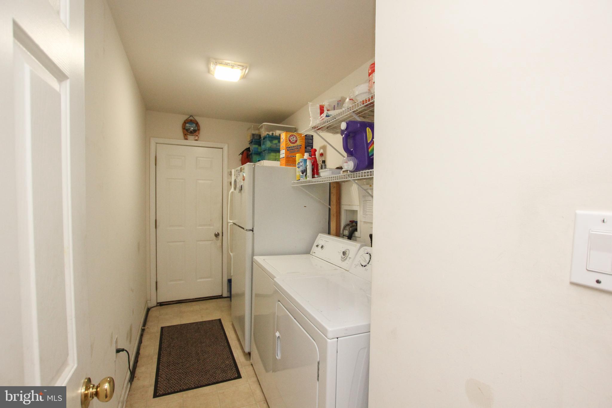 28549 Round Pole Bridge Road Milton, DE 19968 - Photo 19 of 22 Laundry and door to attached garage