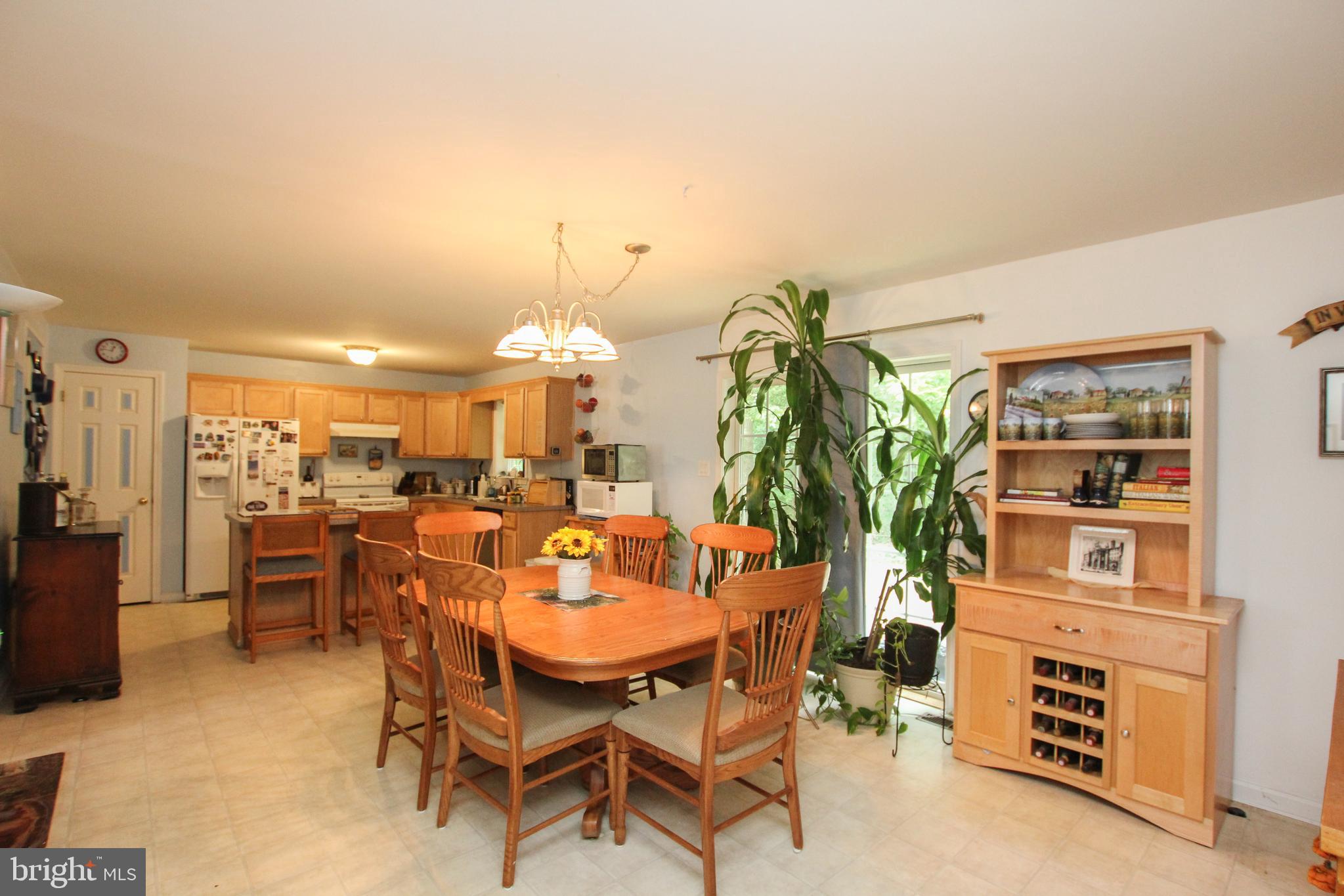 28549 Round Pole Bridge Road Milton, DE 19968 - Photo 7 of 22 Dining Room and Kitchen