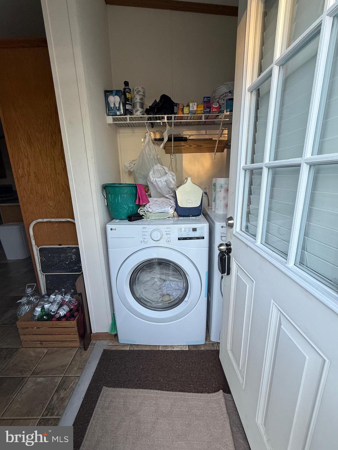 9347 Colonial Mill Drive Delmar, MD 21875 - Photo 10 of 33 a utility room with a sink a washer and dryer