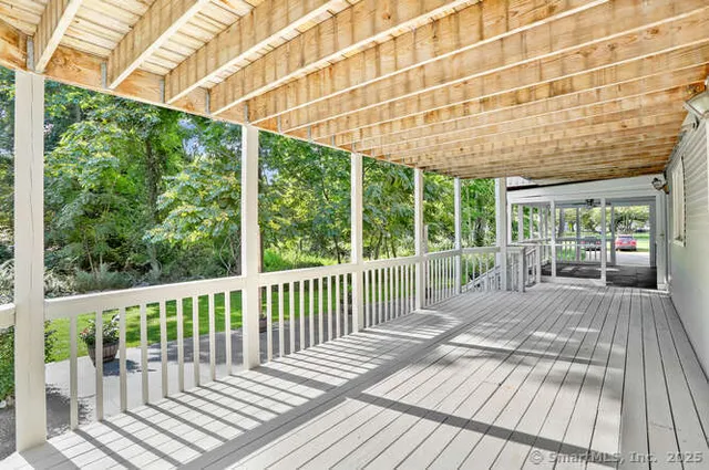 a house view with a wooden floor space
