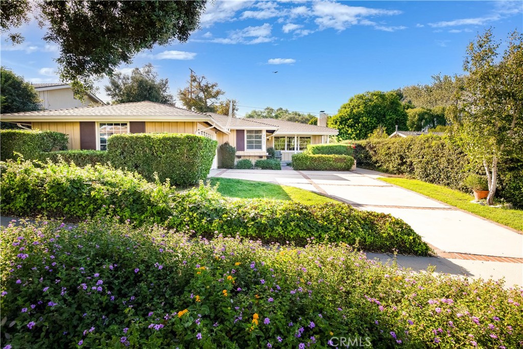 26717 Grayslake Road Rancho Palos Verdes, CA 90275 - Photo 1 of 31 a front view of a house with a yard