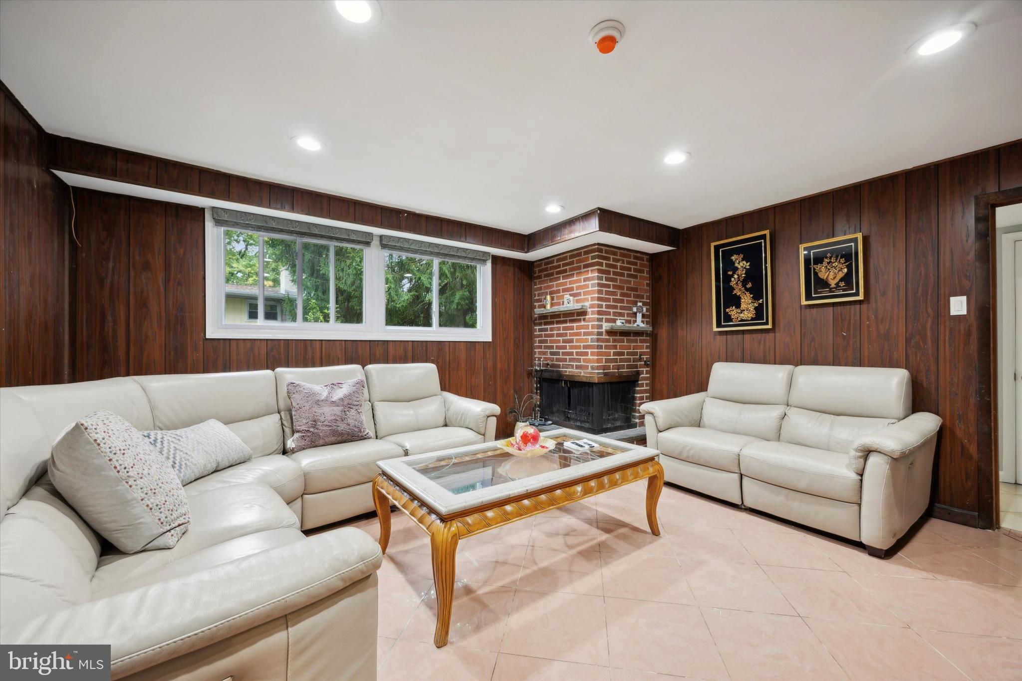 160 Yew Road Cheltenham, PA 19012 - Photo 10 of 24 a living room with furniture and a fireplace