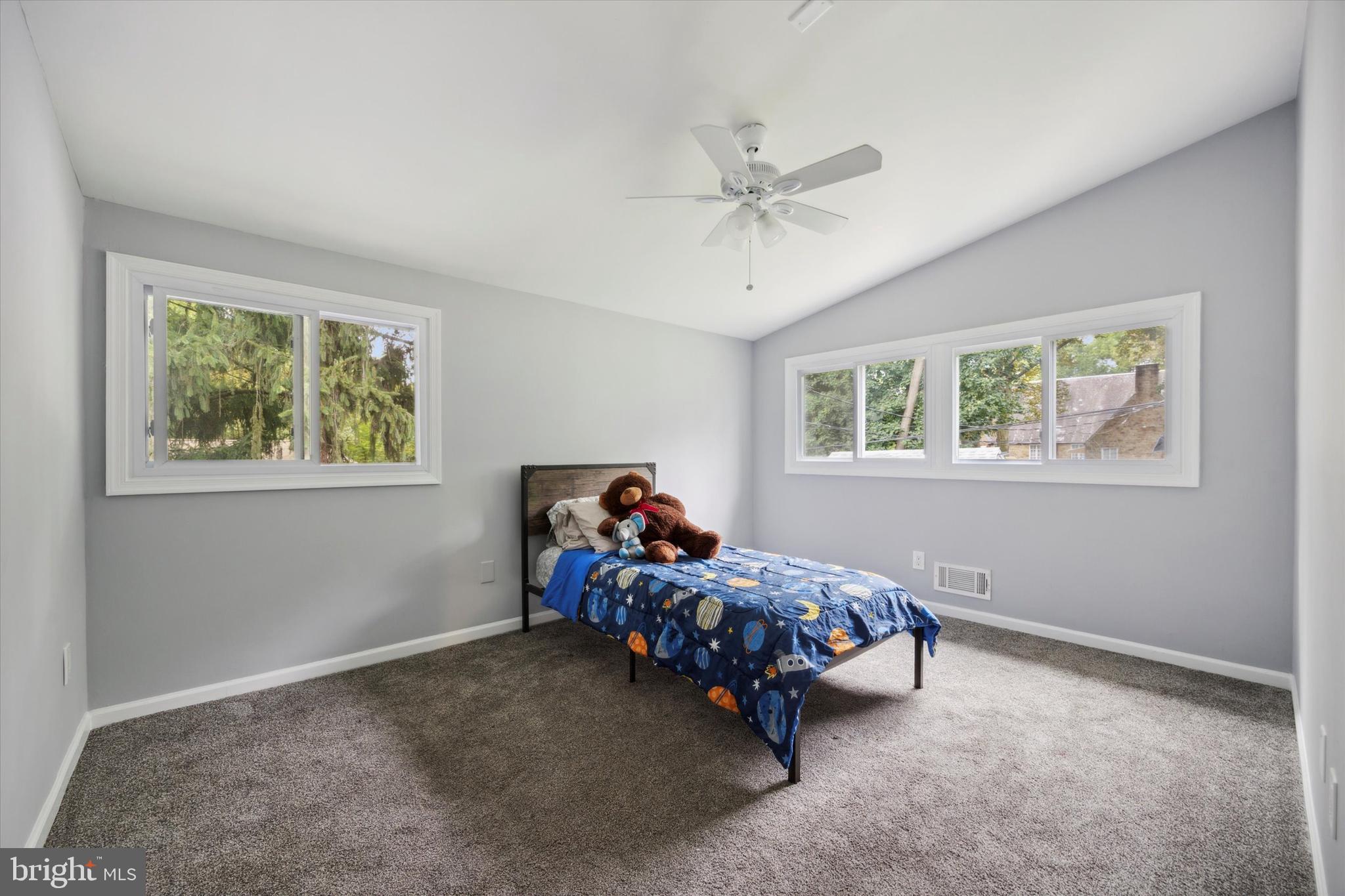 160 Yew Road Cheltenham, PA 19012 - Photo 15 of 24 a bed room with a bed and a window