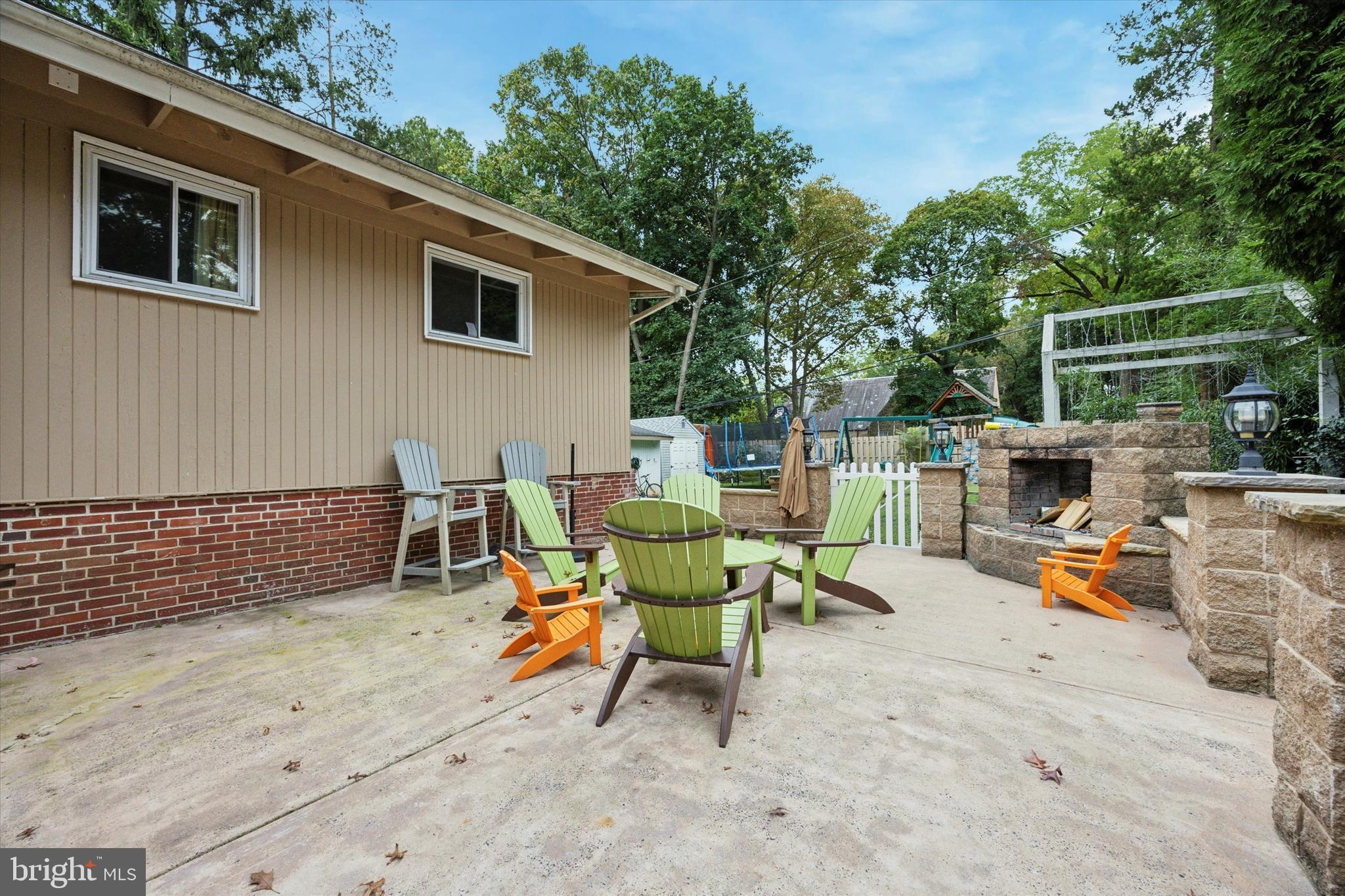 160 Yew Road Cheltenham, PA 19012 - Photo 23 of 24 a backyard of a house with fountain table and chairs