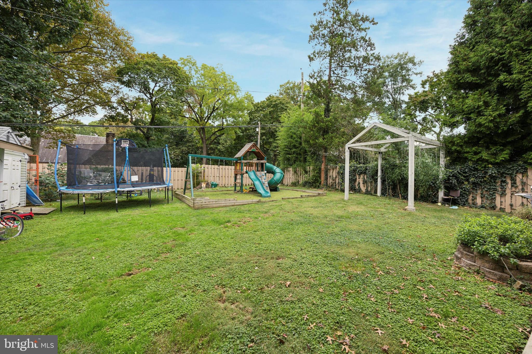 160 Yew Road Cheltenham, PA 19012 - Photo 3 of 24 a view of a house with backyard and sitting area