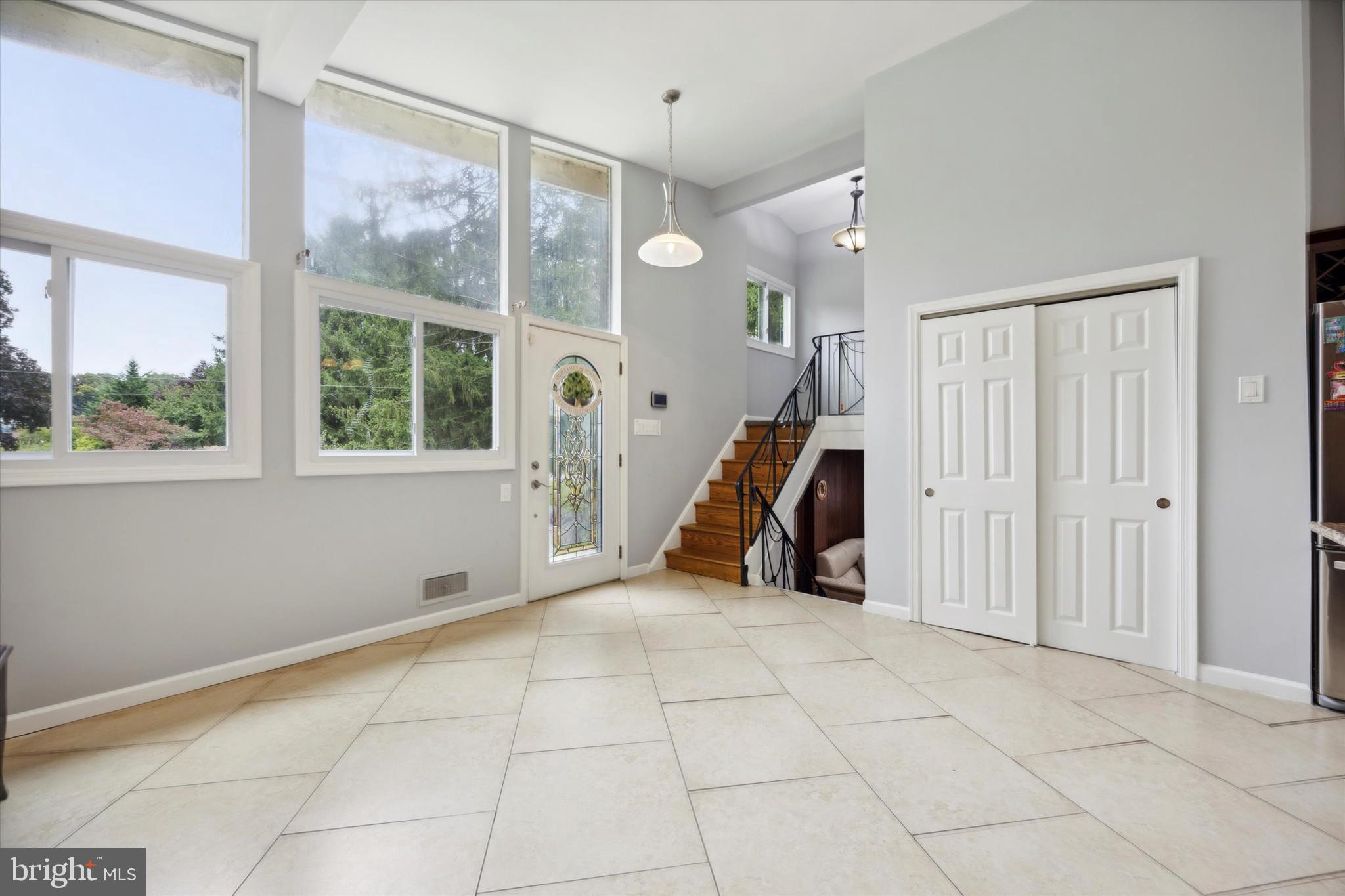 160 Yew Road Cheltenham, PA 19012 - Photo 6 of 24 a view of an empty room with a window