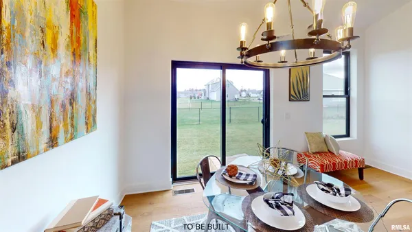 a living room with furniture and window