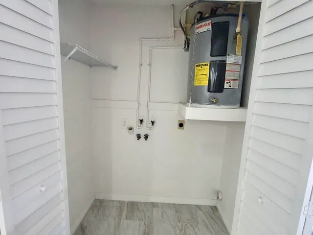 a view of storage and utility room