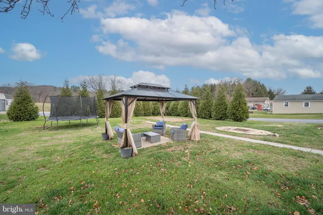 a view of a garden with swimming pool