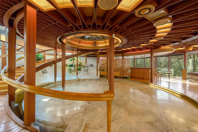 a view of a swimming pool with a patio