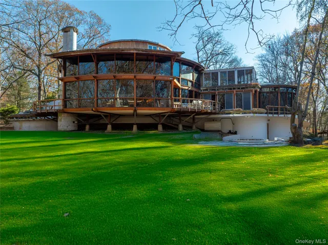 a view of a wooden chairs in patio