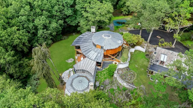 a view of an empty room with a chandelier
