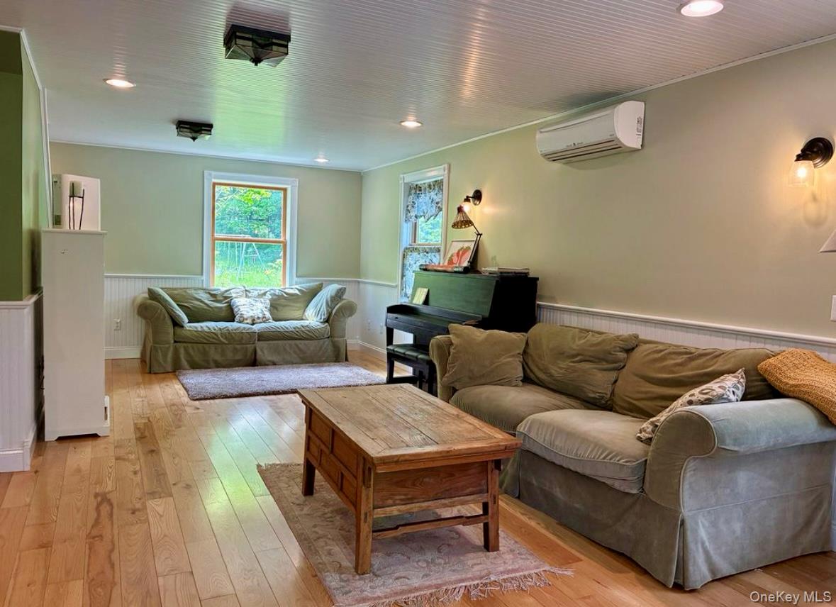 96 Bruceville Road High Falls, NY 12440 - Photo 3 of 21 a living room with furniture and wooden floor