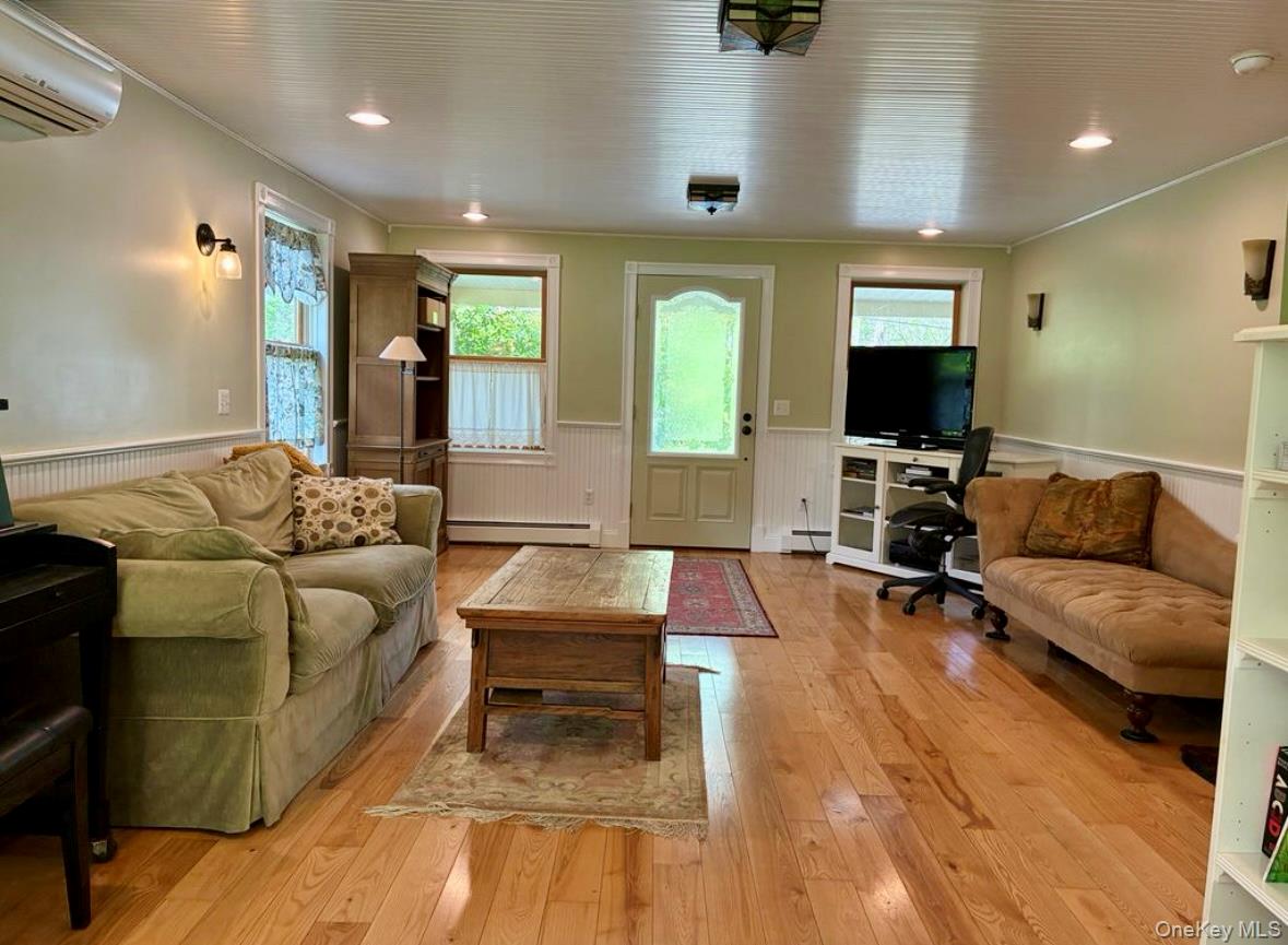 96 Bruceville Road High Falls, NY 12440 - Photo 6 of 21 a living room with furniture and a flat screen tv