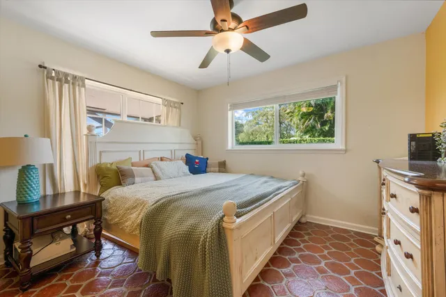 a kitchen with stainless steel appliances granite countertop a stove and a wooden cabinets