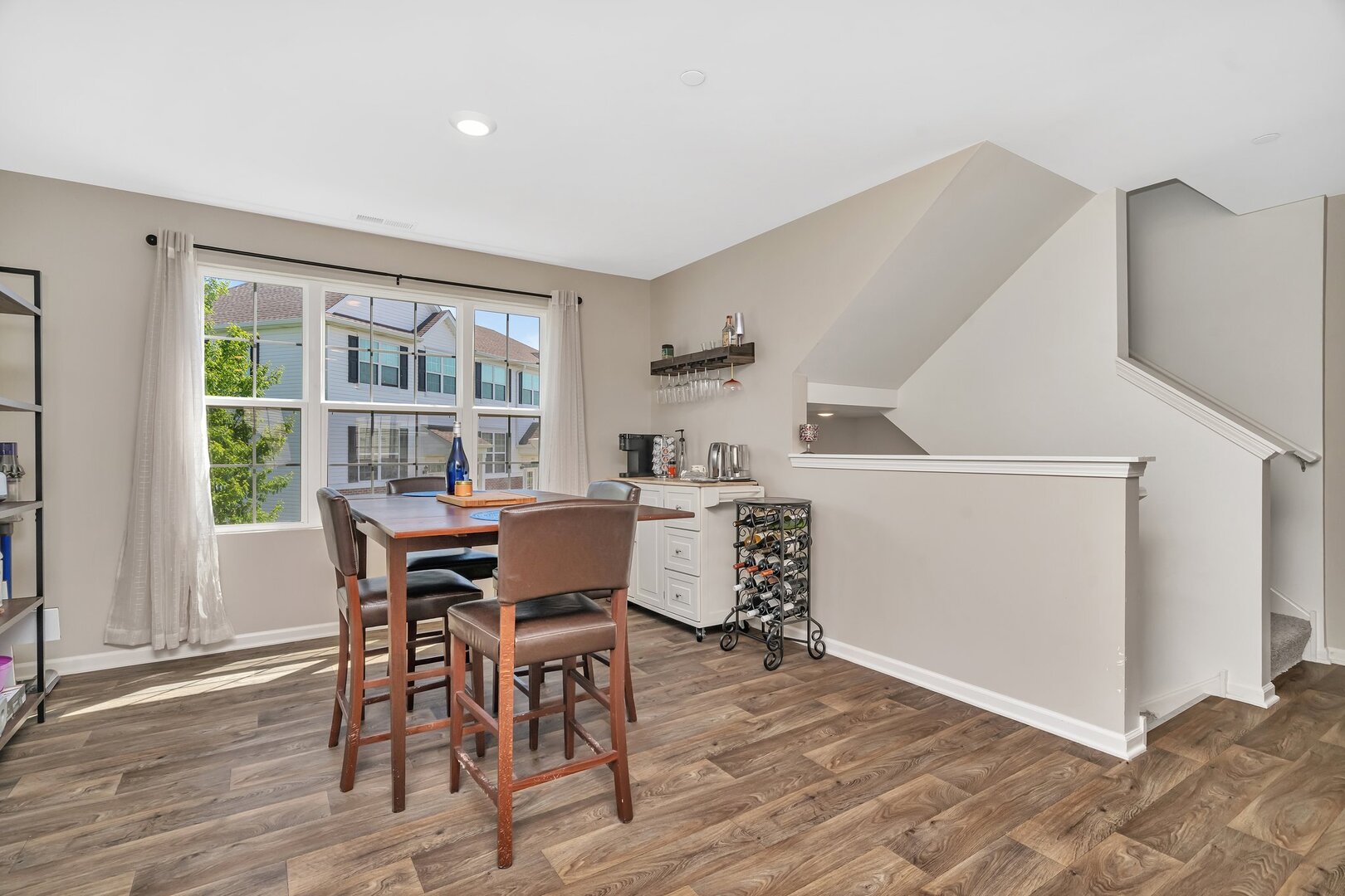 3741 Bailey Road Yorkville, IL 60560 - Photo 15 of 32 a view of a dining room with furniture and wooden floor
