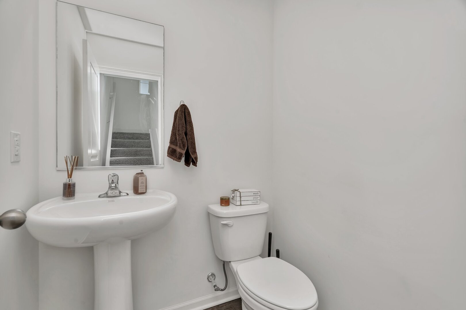 3741 Bailey Road Yorkville, IL 60560 - Photo 16 of 32 a bathroom with a sink mirror and toilet