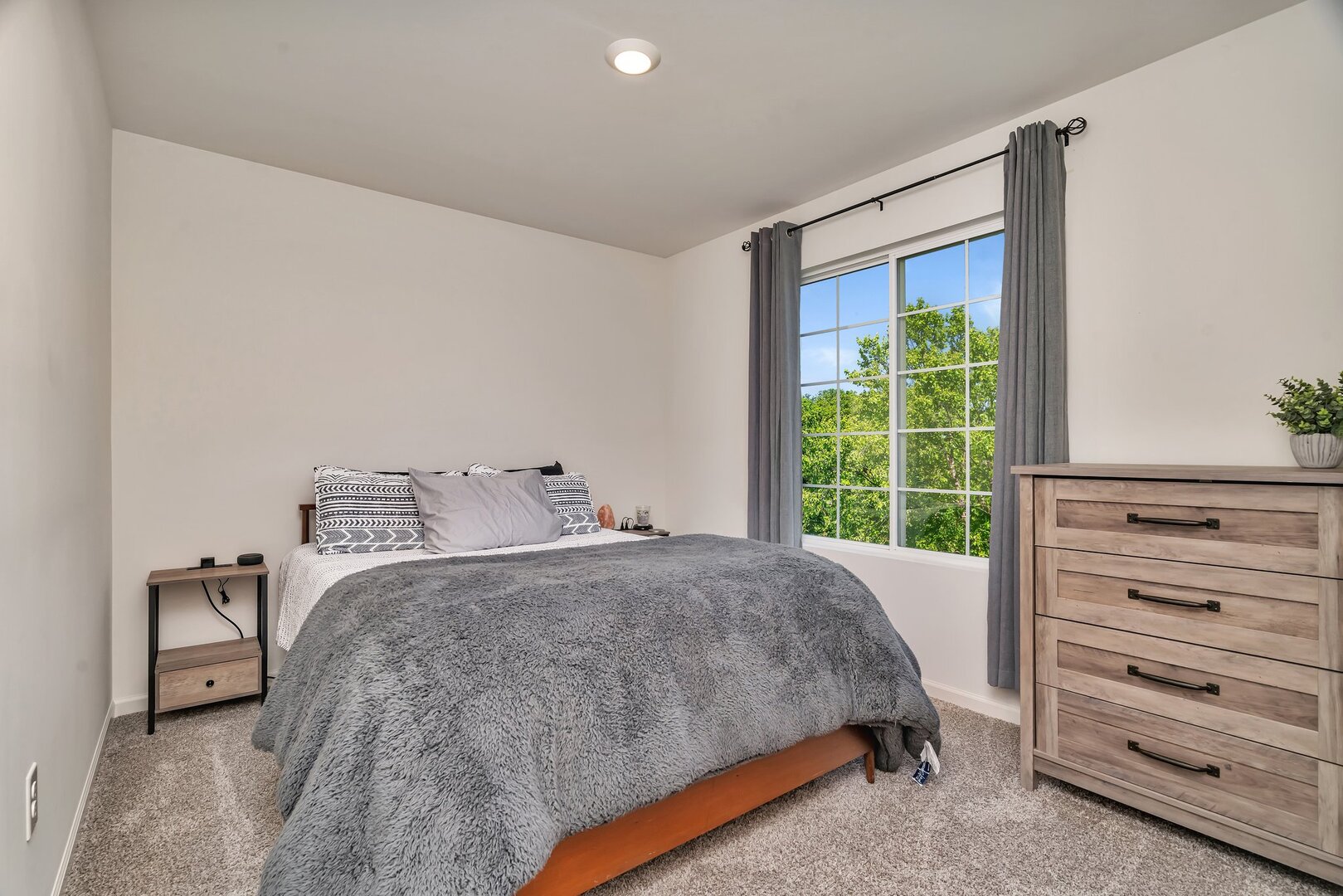 3741 Bailey Road Yorkville, IL 60560 - Photo 17 of 32 a bedroom with a bed and a dresser