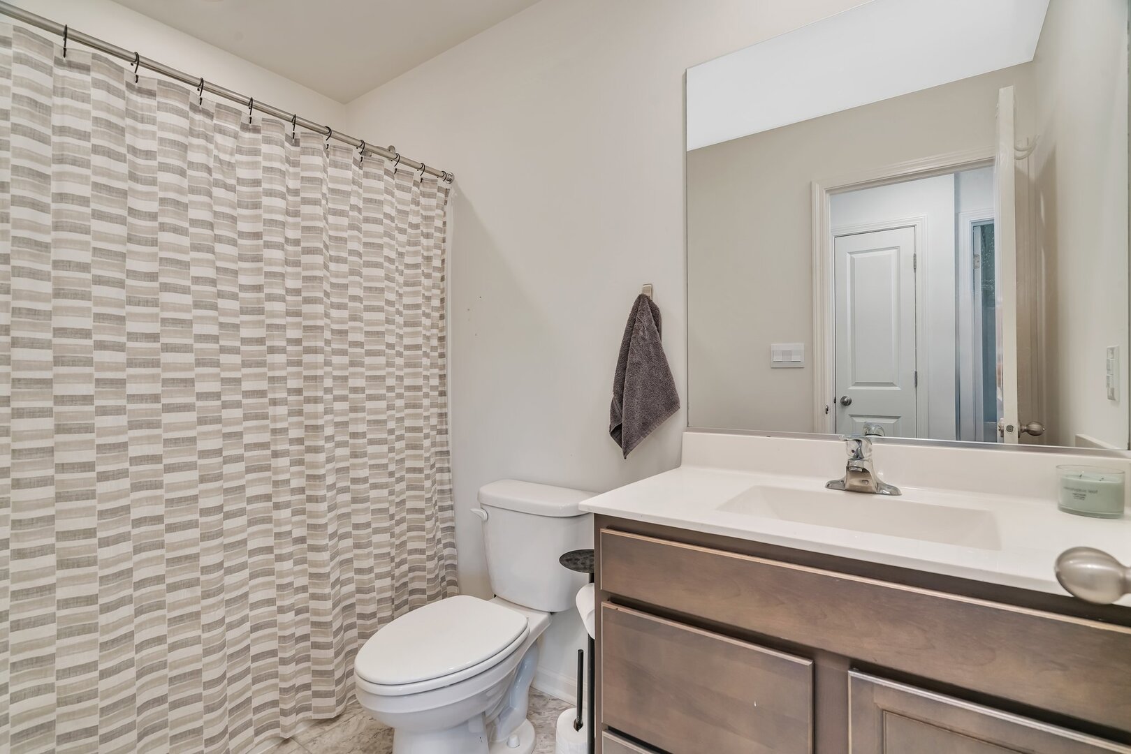 3741 Bailey Road Yorkville, IL 60560 - Photo 21 of 32 a bathroom with a sink a toilet and mirror