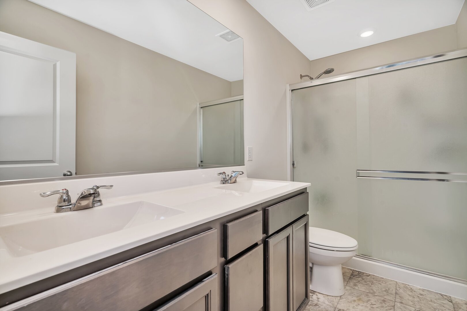 3741 Bailey Road Yorkville, IL 60560 - Photo 25 of 32 a bathroom with a sink toilet and shower