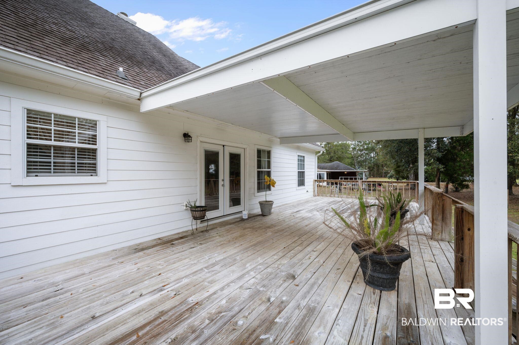 9539 Lakeview Road Bay Minette, AL 36507 - Photo 28 of 45 Wooden deck with french doors