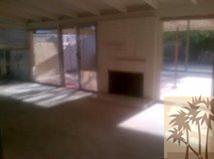 71567 Mirage Road Rancho Mirage, CA 92270 - Photo 2 of 6 a view of empty room with window and wooden floor