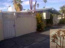 71567 Mirage Road Rancho Mirage, CA 92270 - Photo 5 of 6 a view of a house with a yard