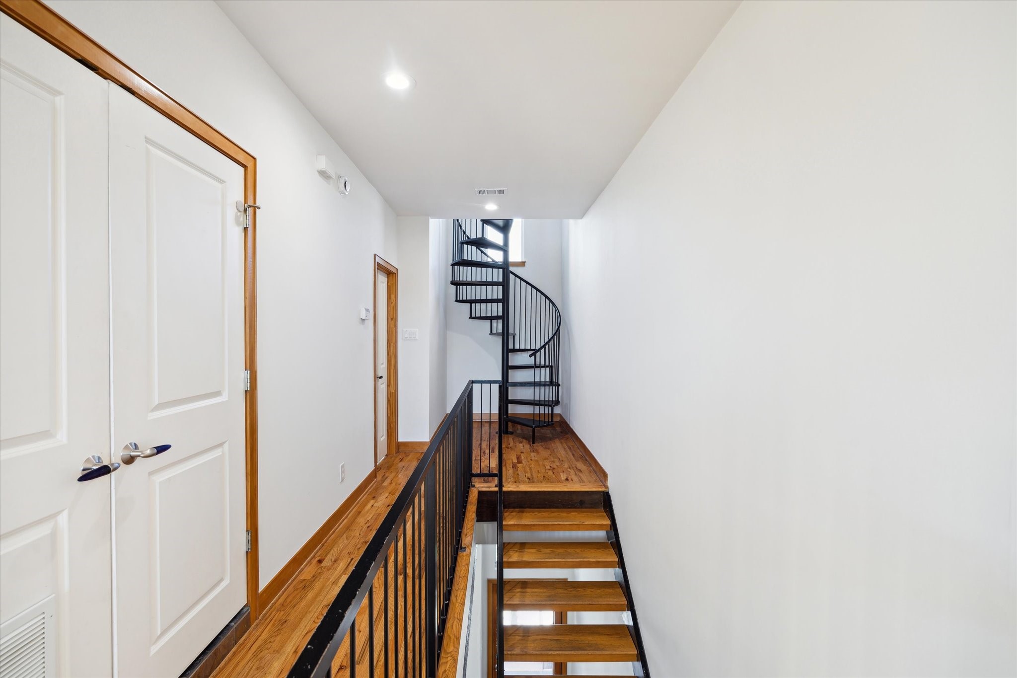 94 Drew Street, Unit C Houston, TX 77006 - Photo 16 of 29 The third floor opens to a private retreat featuring the primary suite and a versatile loft space—an elevated level designed for comfort, privacy, and flexible living.