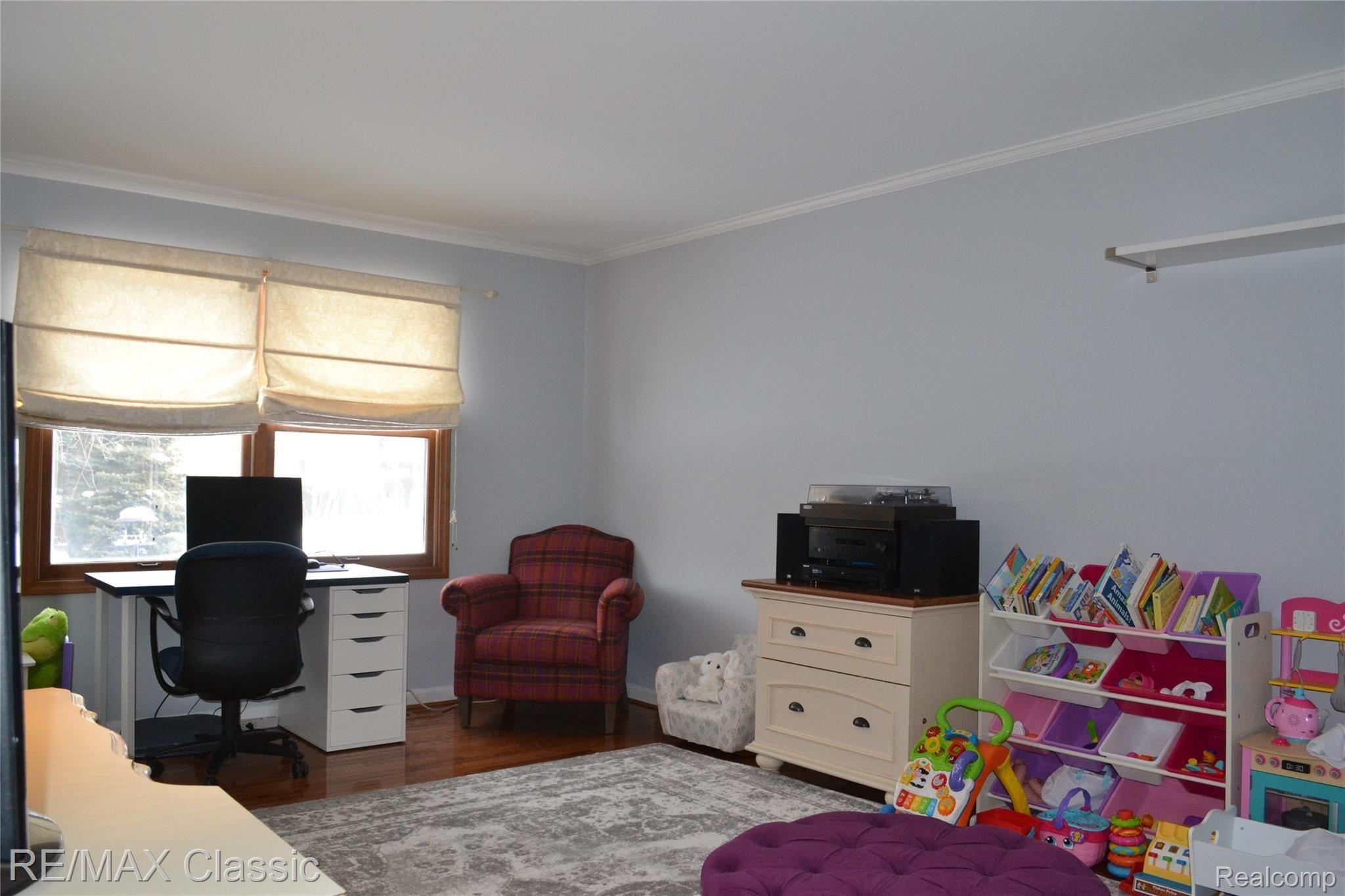 4350 Ravinewood Drive Commerce Township, MI 48382 - Photo 14 of 31 Family Room/ Dining Room