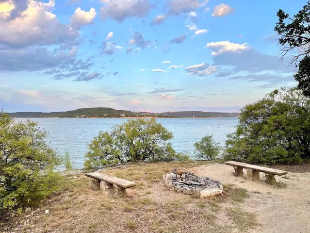 a view of a outdoor space with a lake view