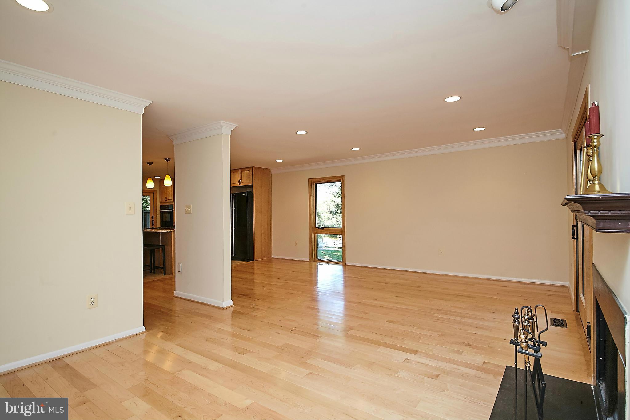 2017 Wethersfield Court Reston, VA 20191 - Photo 13 of 30 Living room view back to dining area and kitchen.