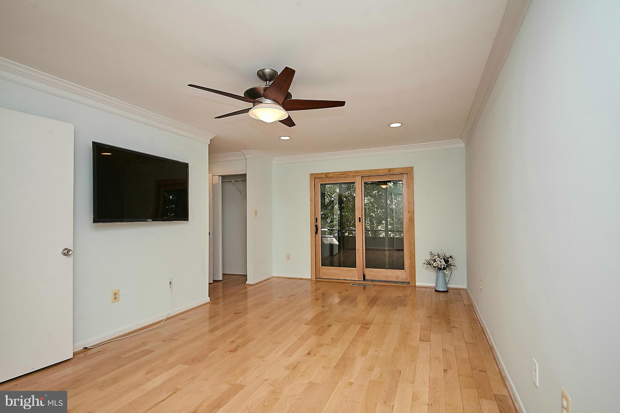 2017 Wethersfield Court Reston, VA 20191 - Photo 17 of 30 Master bedroom flat screen conveys.