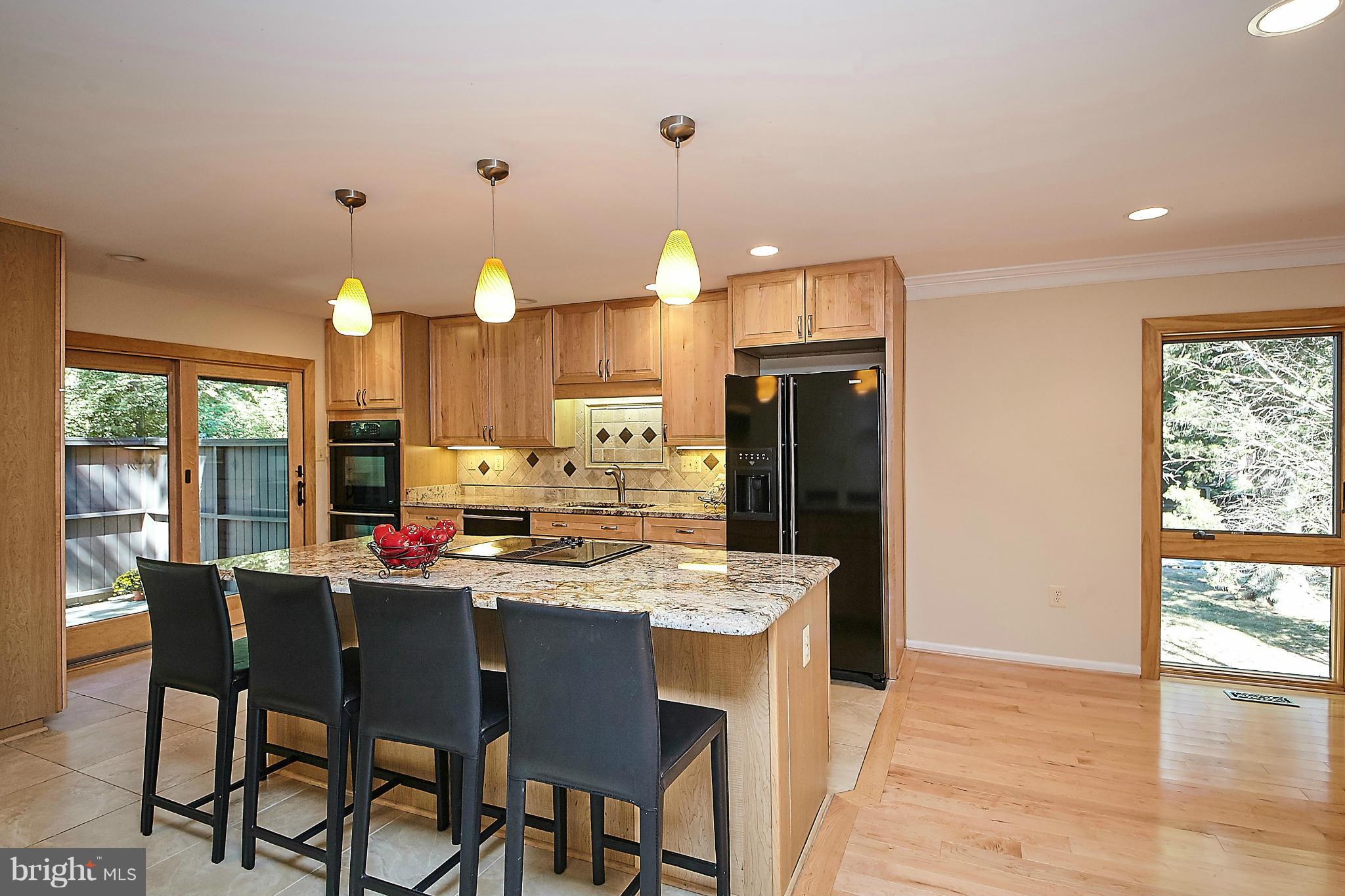 2017 Wethersfield Court Reston, VA 20191 - Photo 8 of 30 View to kitchen patio and end-unit window.
