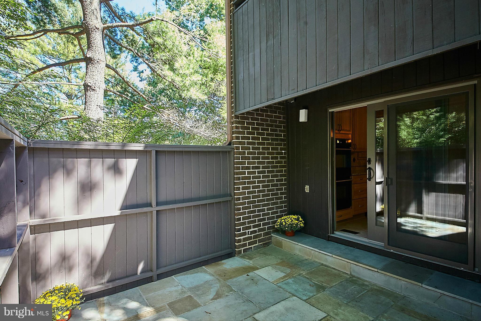 2017 Wethersfield Court Reston, VA 20191 - Photo 9 of 30 Flagstone patio is private. Step out from kitchen.