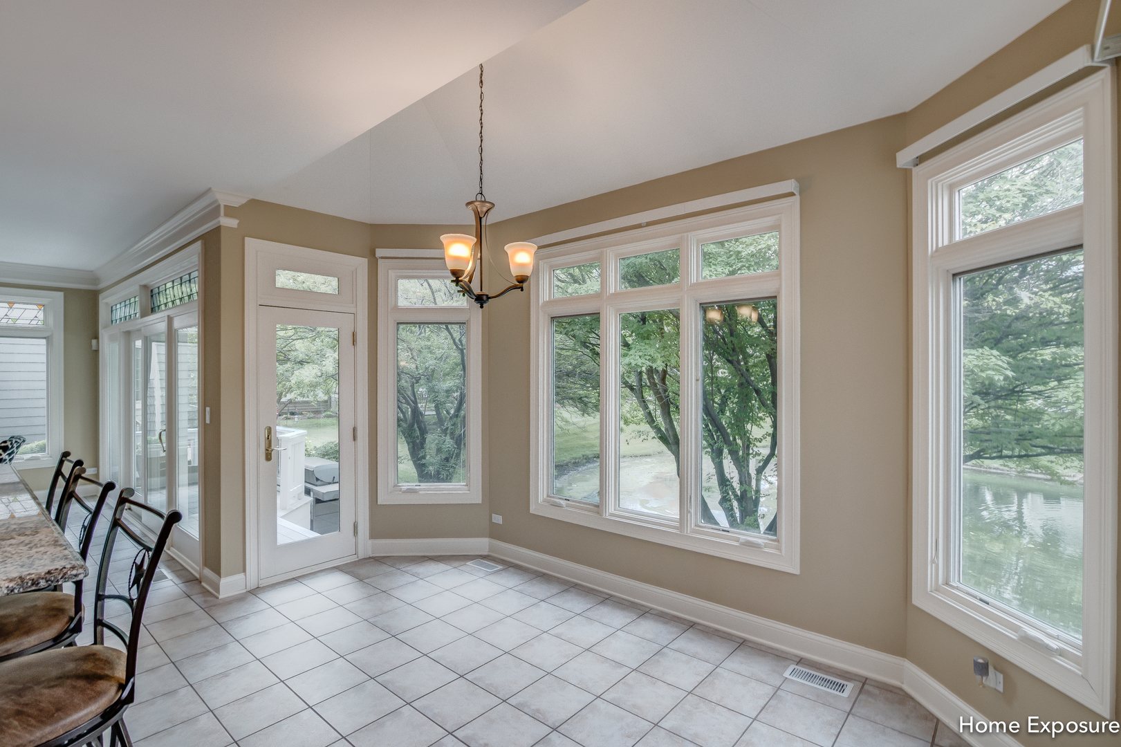 2552 Sutton Lane Aurora, IL 60502 - Photo 14 of 57 a view of an empty room with window and chandelier